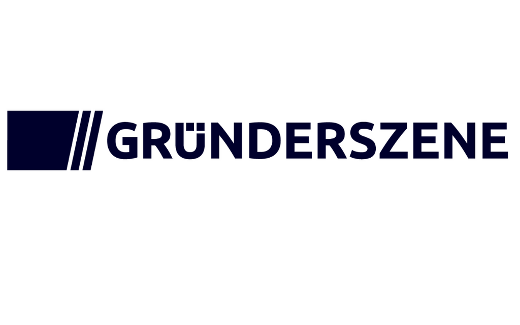 Das Bild zeigt das Wort GRÜNDERSZENE in fetten, dunkelblauen Großbuchstaben mit drei vertikalen blauen Linien innerhalb eines blauen Quadrats auf der linken Seite, alles auf weißem Hintergrund.